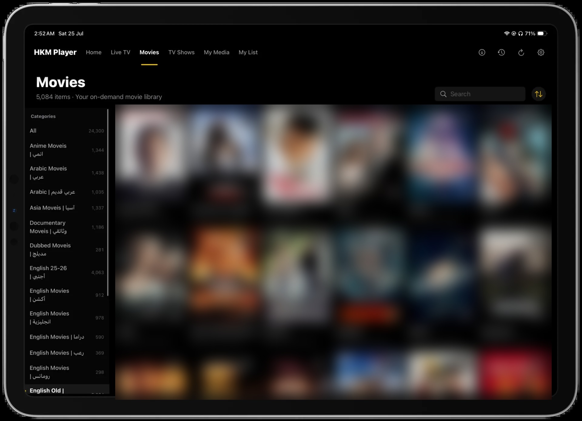 HKM Player movie library on iPad, artwork intentionally blurred